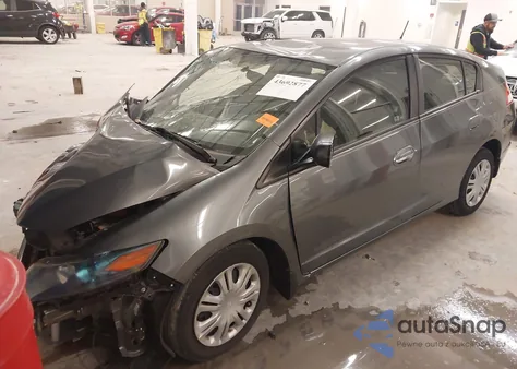 2011 Honda Insight z USA, uszkodzony, nr VIN JHMZE2H35BS004845